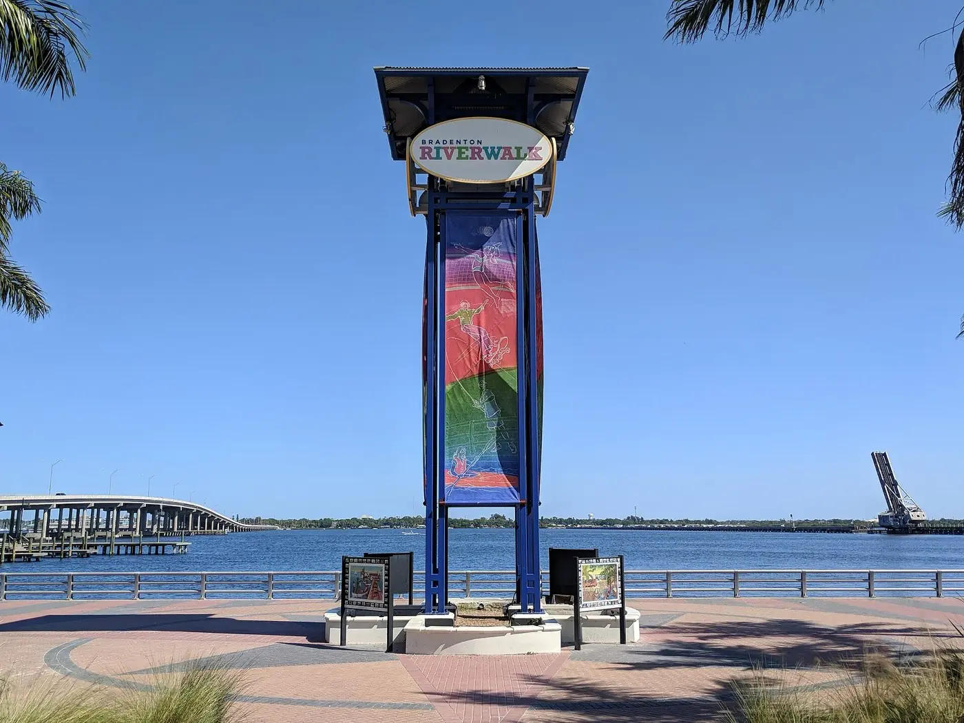 The tower plaza and walkway along the Bradenton Riverwalk beside the Manatee River