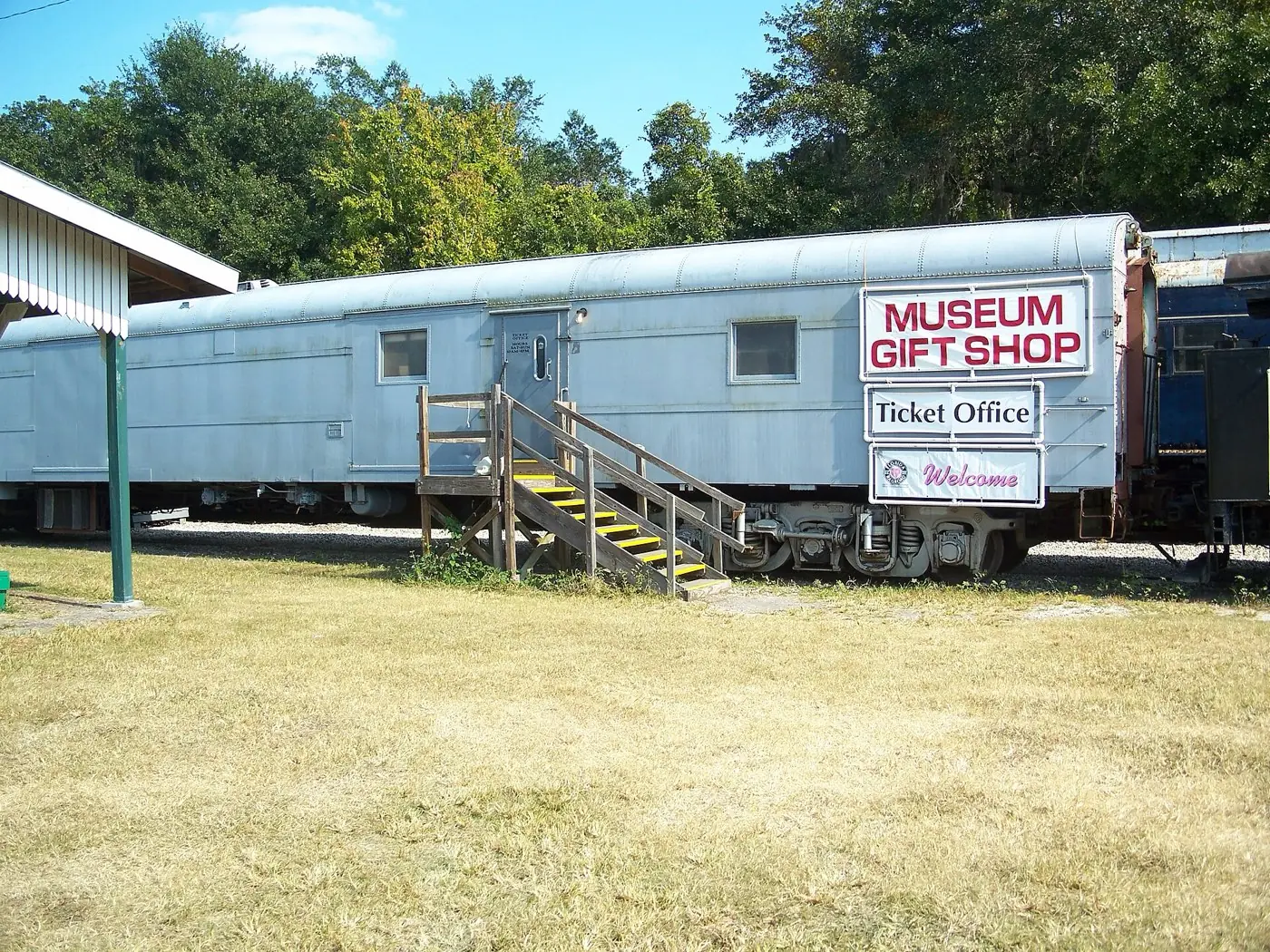 A silver rail car serving as the ticket office at the Florida Railroad Museum in Parrish